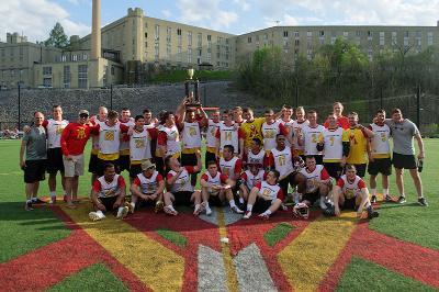 The club lacrosse players pose on the north post turf field.